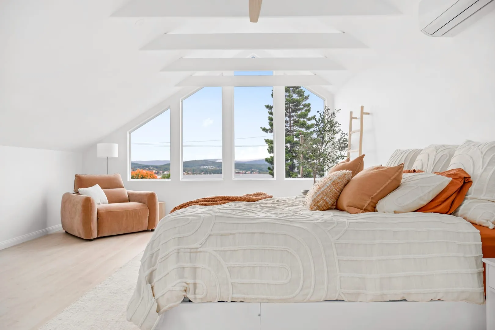 Master suite framing the Lake Macquarie view