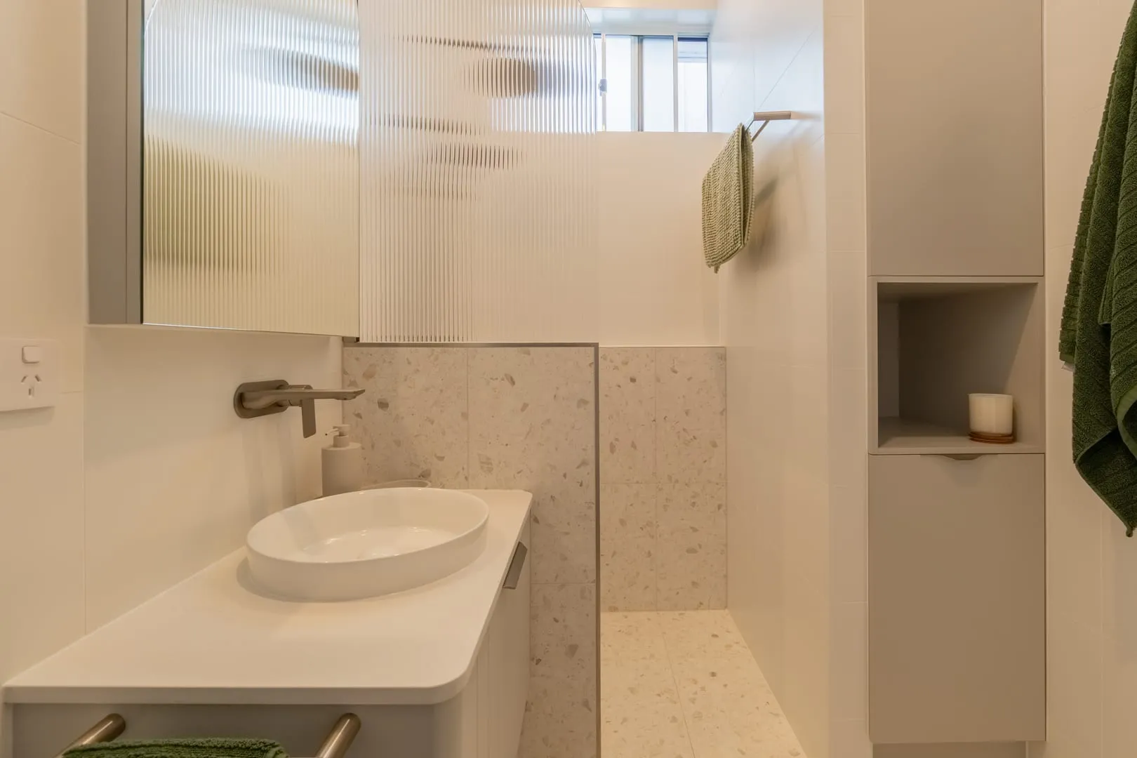 Ensuite with brass tapware