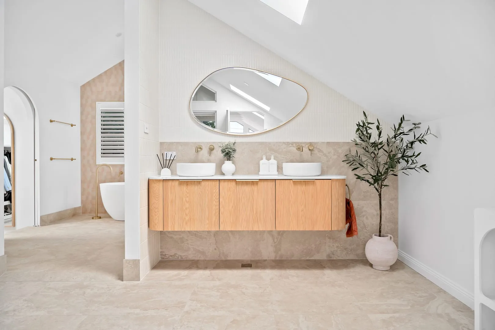 Ensuite with ellipse mirror and twin basins