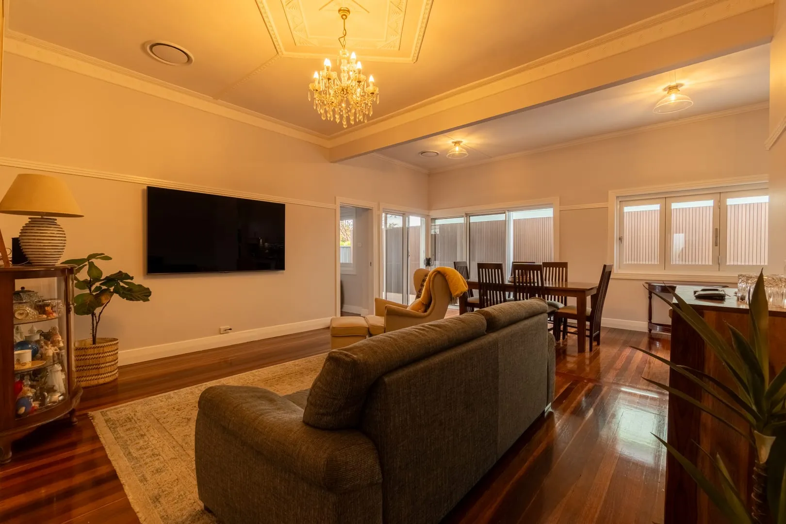 Formal lounge with the original period ceiling